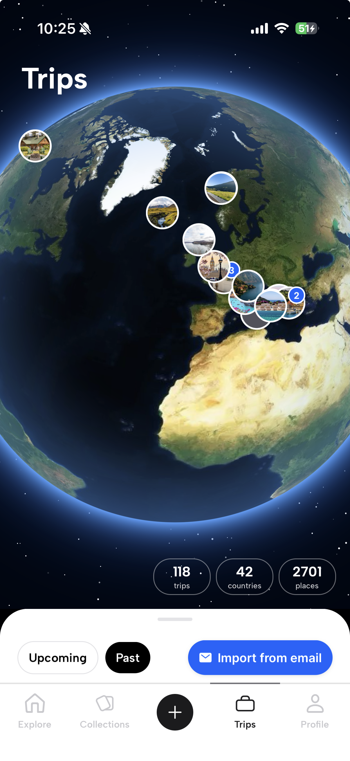 Voyin Trips screen with a large interactive globe